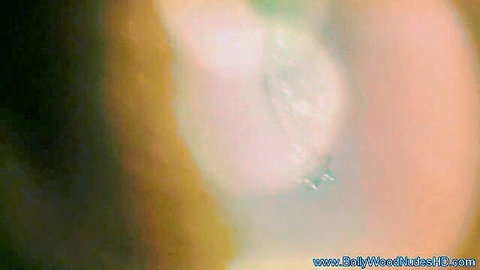 Close-up sultry gaze of Indian exotic temptress, Bollywood style allure