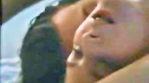 Ecstatic black woman close-up in intimate cuckold embrace