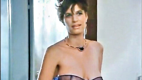 Vintage busty brunette in sheer purple lingerie exposing huge tits and hard nipples