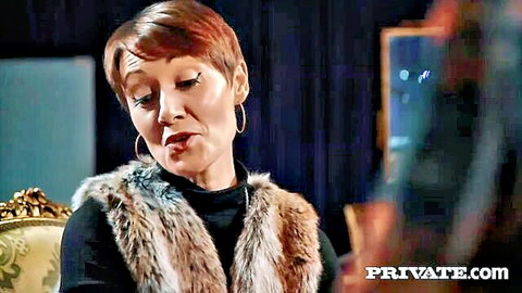 Ella Hughes seductive close-up in black turtleneck and fur vest