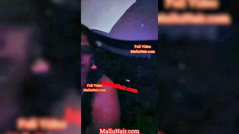 Anu Telugu woman in red dress in dark cave-like outdoor scene