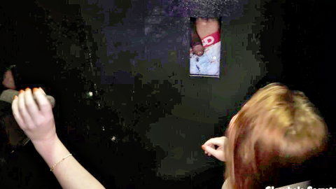 Yaya's Gloryhole Secrets debut: redhead interacting at the hole
