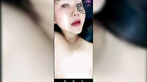 Blurry selfie of sexy Indonesian girl, topless tease, intense gaze, amateur bokep indo thumbnail