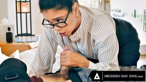 Dana Vespoli as caring MILF teacher giving handjob to injured student