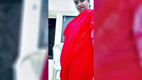 Curvy Indian woman in red saree posing seductively on Tango live