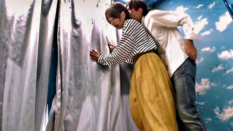 Japanese wife receives clothed massage from stranger, husband nearby