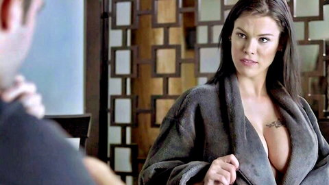 Peta Jensen in open gray robe revealing big tits and tattoo