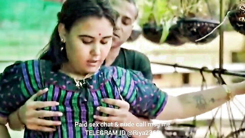 Indian woman in colorful saree gropes breasts with man behind in hot Malayalam short film
