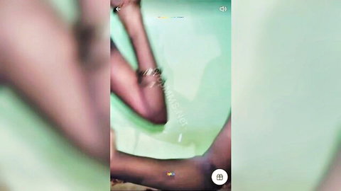 Blurry green Snapchat filter on extended arm with bracelet teasing viewer