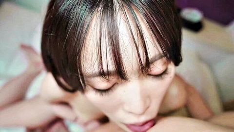 Japanese amateur brunette with small tits eyes closed tongue out during POV blowjob face fuck