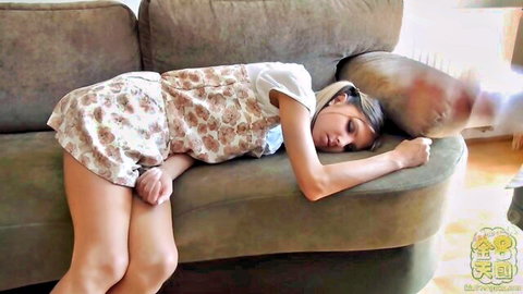 Petite fair-skinned girl sleeping on couch in short floral dress exposing smooth legs and small ass