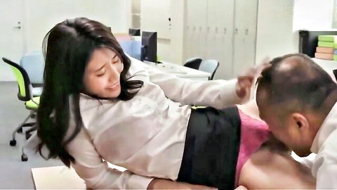 Japanese office slut smiles as bald coworker licks her pussy with pink panties aside