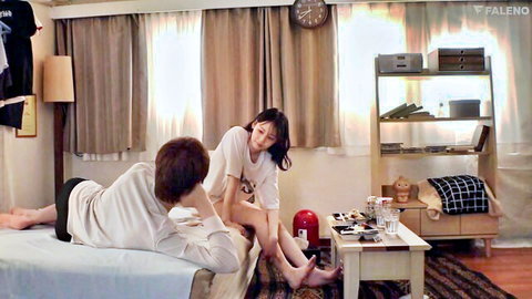 Asian couple waking up casually in bed on Saturday morning