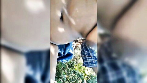 Blurry Mallu Indian woman in plaid skirt outdoor exposure
