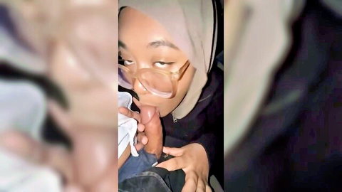Malay hijab girl giving blowjob in car