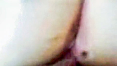 Amateur closeup of wet hairy pussy with spread labia exposing pink tight hole