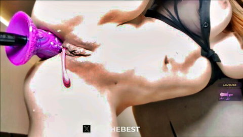 Blonde in black lingerie inserts purple dildo into wet pussy close-up