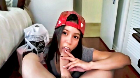 Petite brunette teen in red cap spreads legs fingering wet shaved pussy