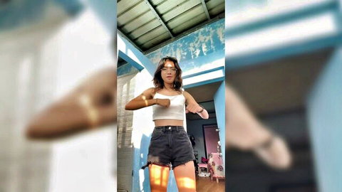 Sikey Alt Girl in white crop top and black shorts, posing seductively