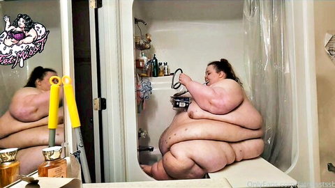 Massive SSBBW soaping up in steamy shower