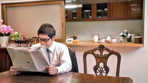 Tia Bejean in domestic scene, man in suit reading newspaper