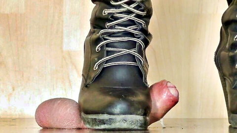 Mistress black leather boot sole crushing slave's pink balls in hardcore femdom CBT trampling