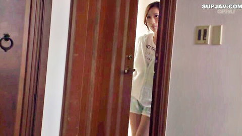 Julia Boin peeking seductively from door in crop top and shorts