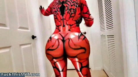 Curvy PAWG in glossy red Carnage symbiote bodysuit flaunts massive shiny ass cheeks from behind
