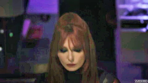 Seductive redhead with intense gaze in Black Widow XXX parody