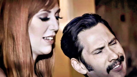 Lauren Phillips smiles seductively over aroused man in Nuru massage