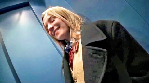 Cute blonde teen smiling in black coat and scarf, AMWF adult video