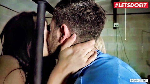 Abella Danger and Zoey Monroe seducing jail guardian with passionate kiss