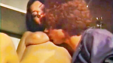 Retro hardcore scene: busty brunette gets tits kissed by redhead lover