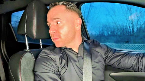 Handsome private driver in car, ready for Angela's special thanks