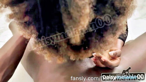 Curly-haired ebony babe fingers her wet pussy in bubble bath solo
