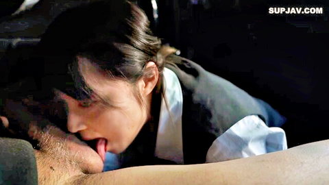 Asian woman in uniform passionately tongue-kissing bearded man in uncensored JAV scene