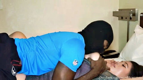 Masked black man in blue shirt chokes and gropes busty brunette during rough missionary sex