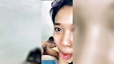 Two Asian besties sharing cock in steamy threesome, tongue out tease