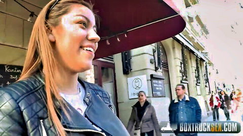 Katie Vazquez blonde smiling outdoors in leather jacket
