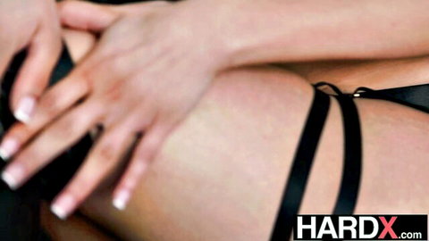 Fair-skinned babe in black thigh garter lingerie teases crotch with french-tipped nails