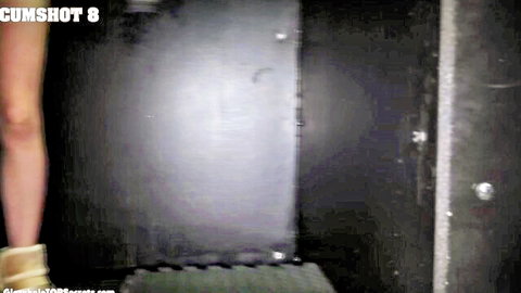 Big cock shoots thick cum through glory hole towards petite girl's tan high heel foot