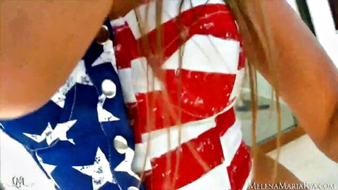 Melena Maria Rya in sexy American flag bustier, teasing cleavage