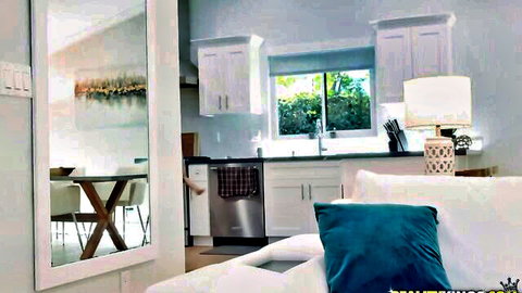 Ivy LeBelle in modern kitchen and living room setting