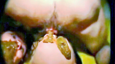 Close-up of woman's spread ass and dripping pussy in explicit view