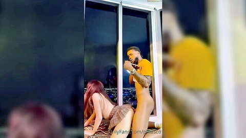 Redhead in skirt gets doggy style fucked against window