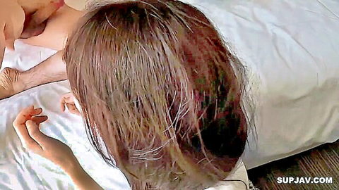 Asian woman with long brown hair in doggy style sex on bed, uncensored amateur JAV