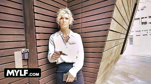 Filthy Frankie British MILF in white blouse black skirt outdoor pose