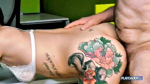 Tattooed Asian babe with big tits in white lingerie touched by man