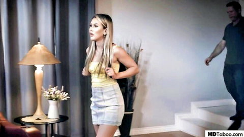 Paige Owens as blonde escort in yellow top and mini skirt, teasing in taboo fantasy scene