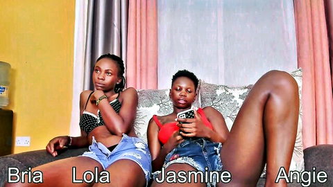 Two ebony beauties Bina Lola and Jasmine Angie lounging in short shorts, teasing big booties